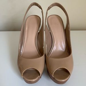 Nude patent stilettos